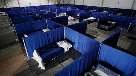 C.D.C. Shortens Isolation Period for People With Covid.